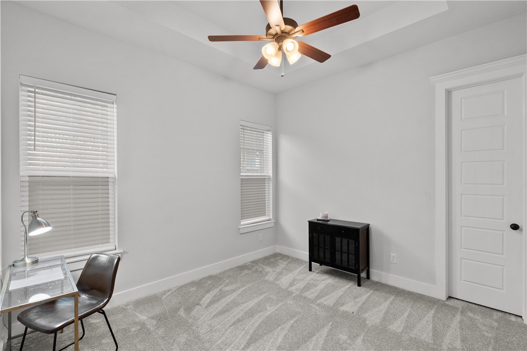 5001 Greenstone Way Bryan, TX 77802 - Photo 28 of 43 a living room with furniture and a window