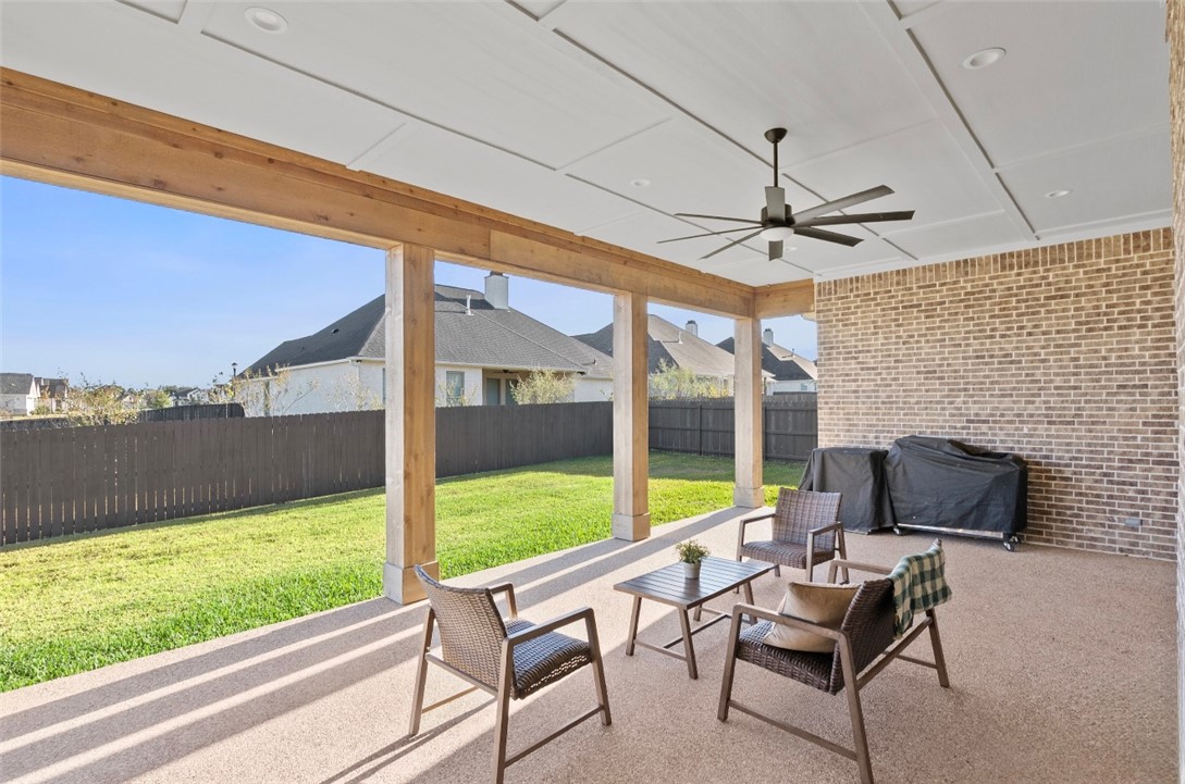 5001 Greenstone Way Bryan, TX 77802 - Photo 35 of 43 a view of a patio with a table and chairs