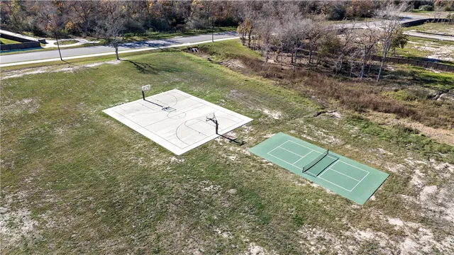 a view of a tiny house with a yard