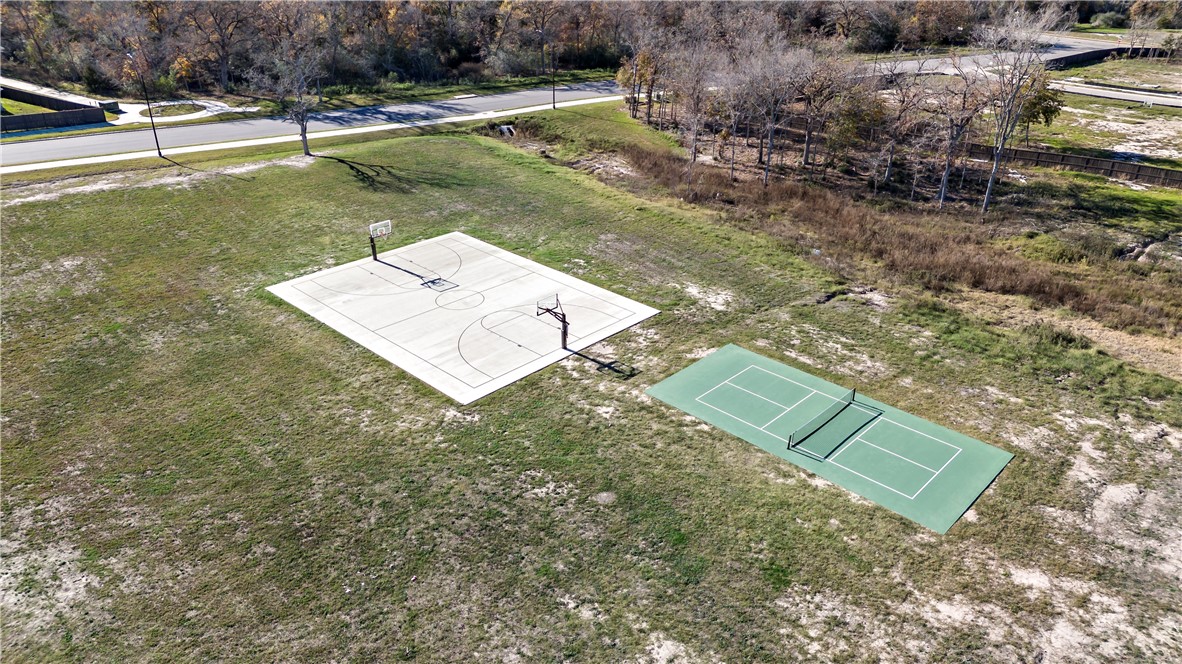 5001 Greenstone Way Bryan, TX 77802 - Photo 42 of 43 a view of a tiny house with a yard