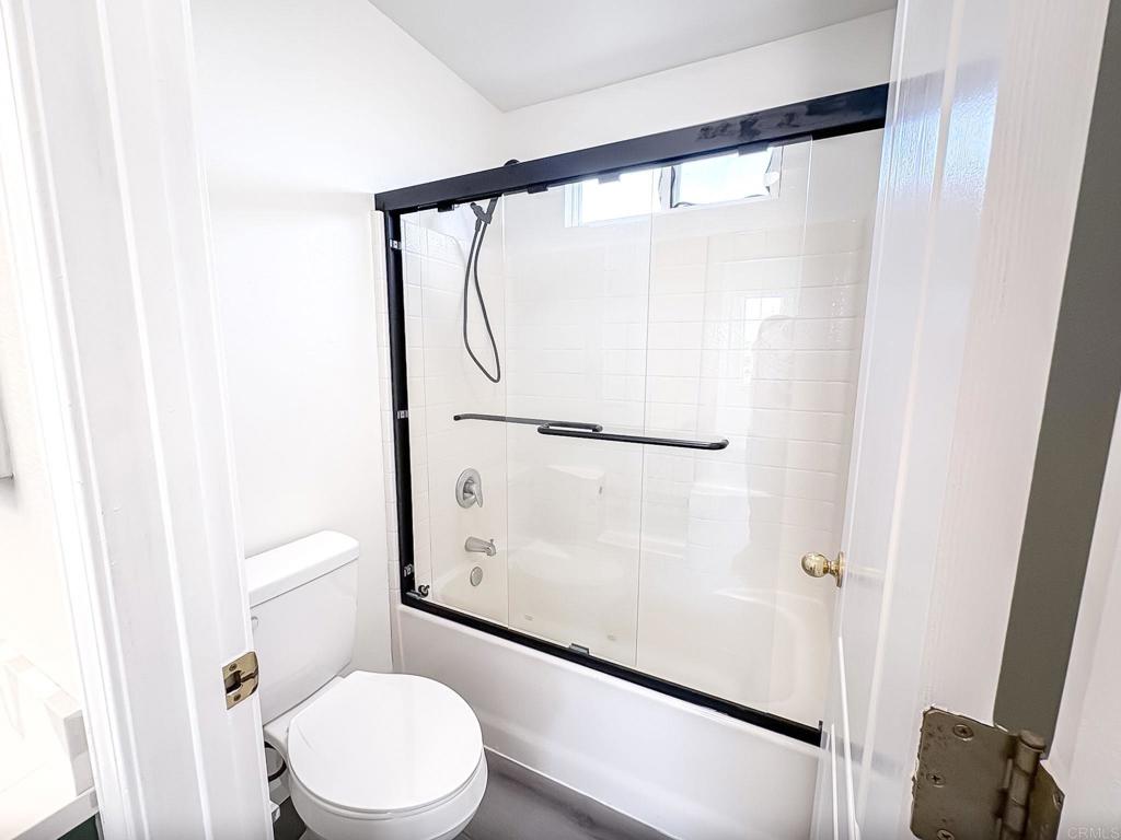 3005 Litt Road Modesto, CA 95355 - Photo 36 of 53 a white toilet sitting next to a shower