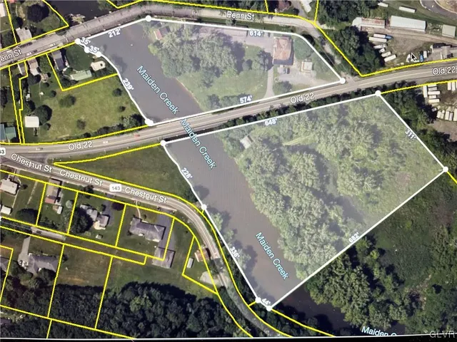 a view of a swimming pool with a yard