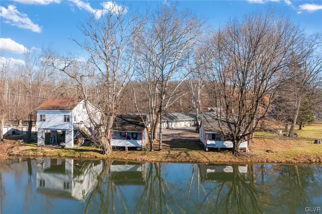 a view of livingroom with furniture and window