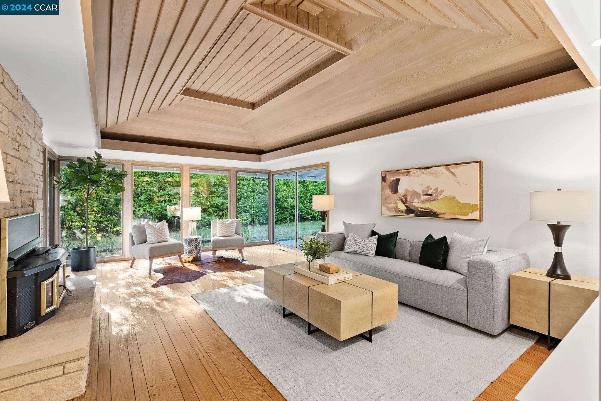 3644 Happy Valley Road Lafayette, CA 94549 - Photo 1 of 1 a living room with furniture and a large window