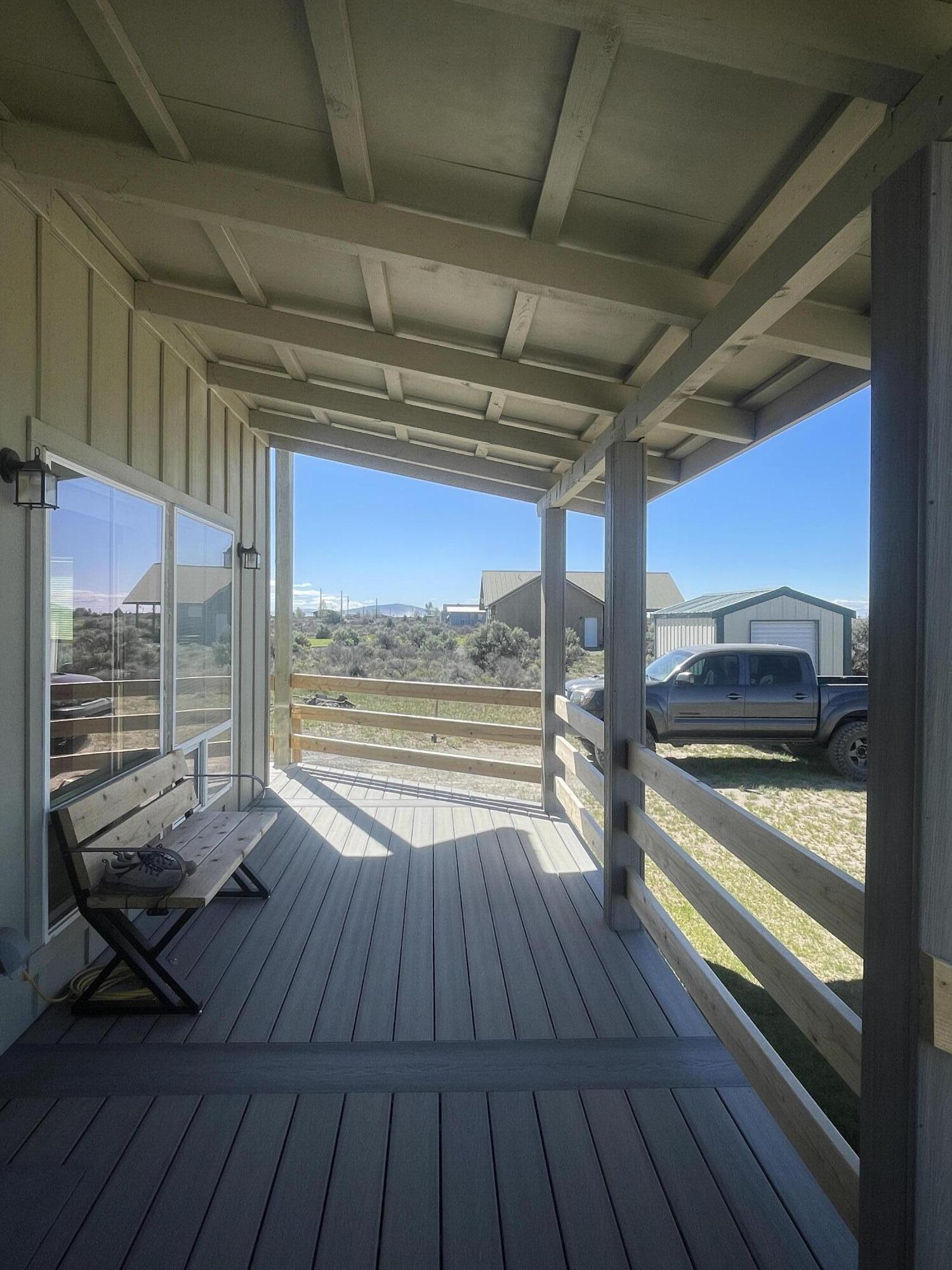 57655 Fall Road Christmas Valley, OR 97641 - Photo 3 of 25 a view of a balcony with wooden floor
