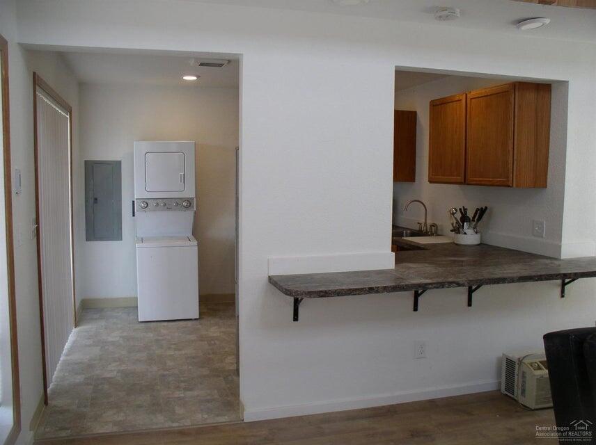 57655 Fall Road Christmas Valley, OR 97641 - Photo 4 of 25 a room with a table and chairs