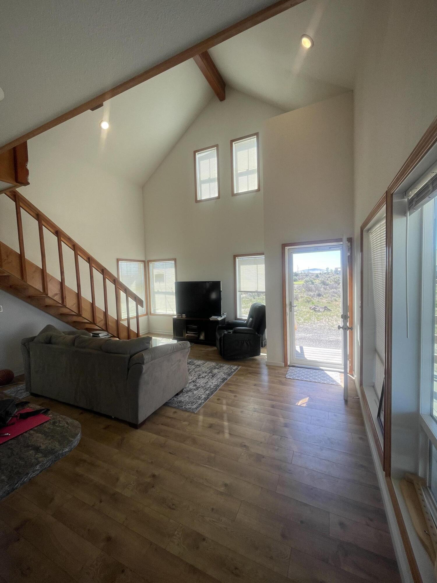 57655 Fall Road Christmas Valley, OR 97641 - Photo 10 of 25 a living room with furniture and a wooden floor
