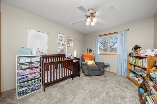 a bedroom with furniture and a window