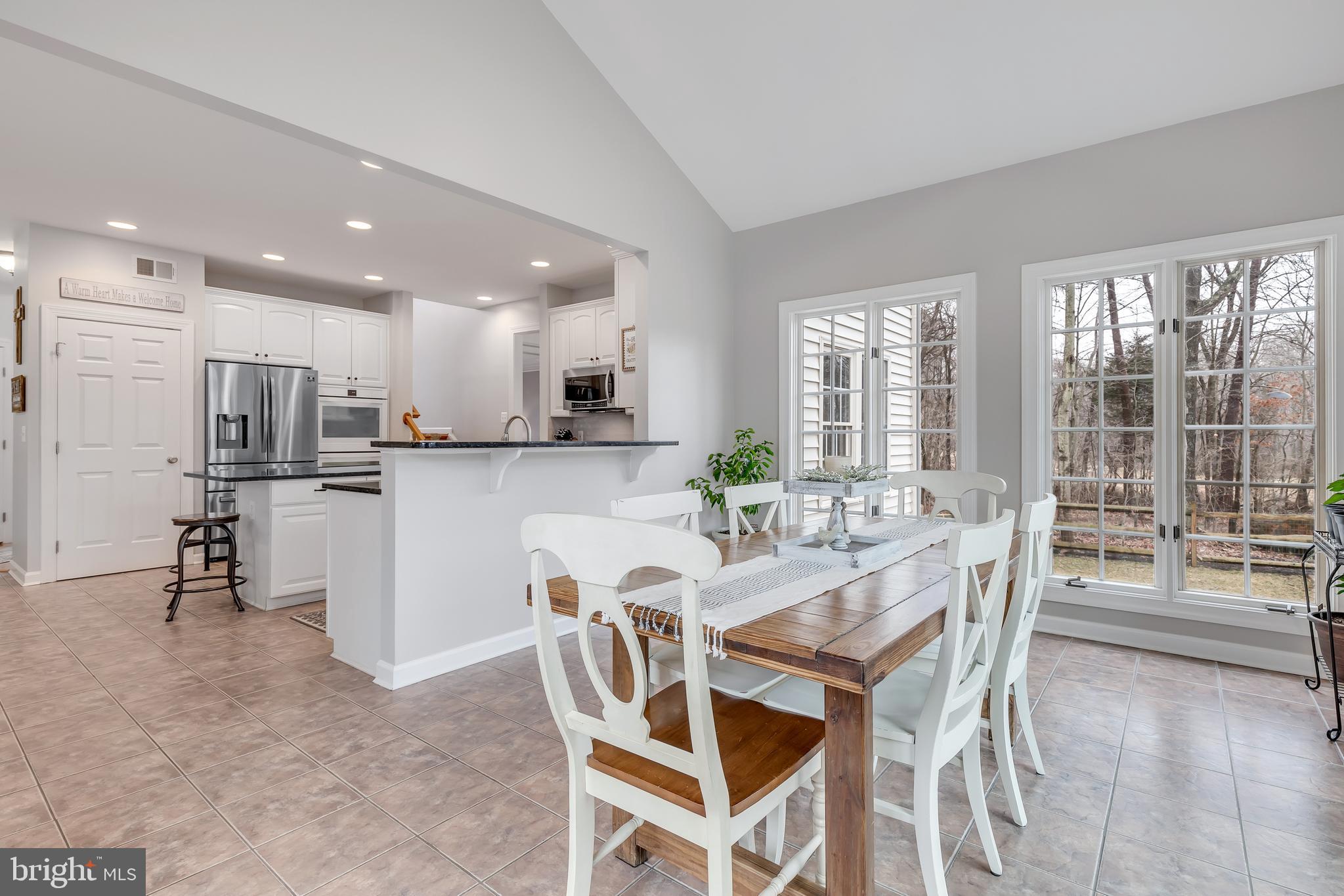 14413 Clubhouse Road Gainesville, VA 20155 - Photo 16 of 59 Sun Room Adjacent to Open Concept Kitchen