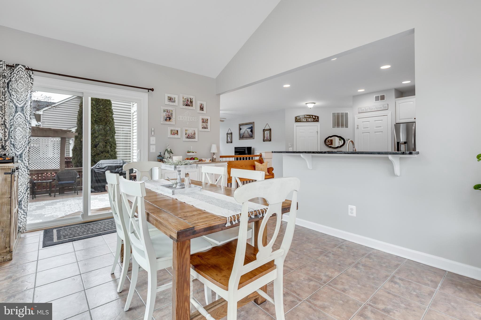 14413 Clubhouse Road Gainesville, VA 20155 - Photo 17 of 59 Light-filled Sun Room with Cathedral Ceilings