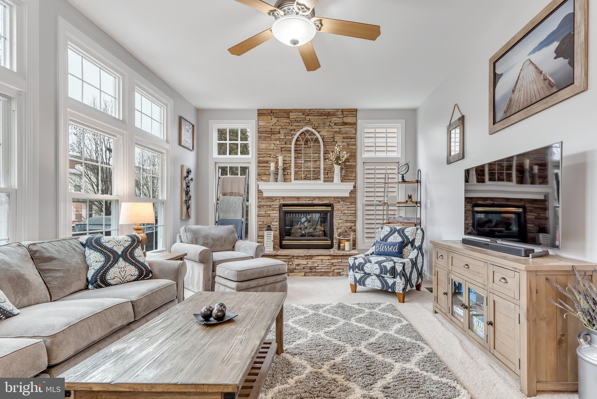 14413 Clubhouse Road Gainesville, VA 20155 - Photo 19 of 59 Bright Family Room with Fireplace