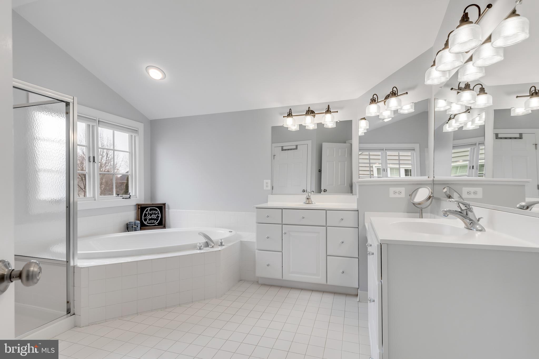 14413 Clubhouse Road Gainesville, VA 20155 - Photo 27 of 59 En Suite Bathroom with Separate Soaking Tub