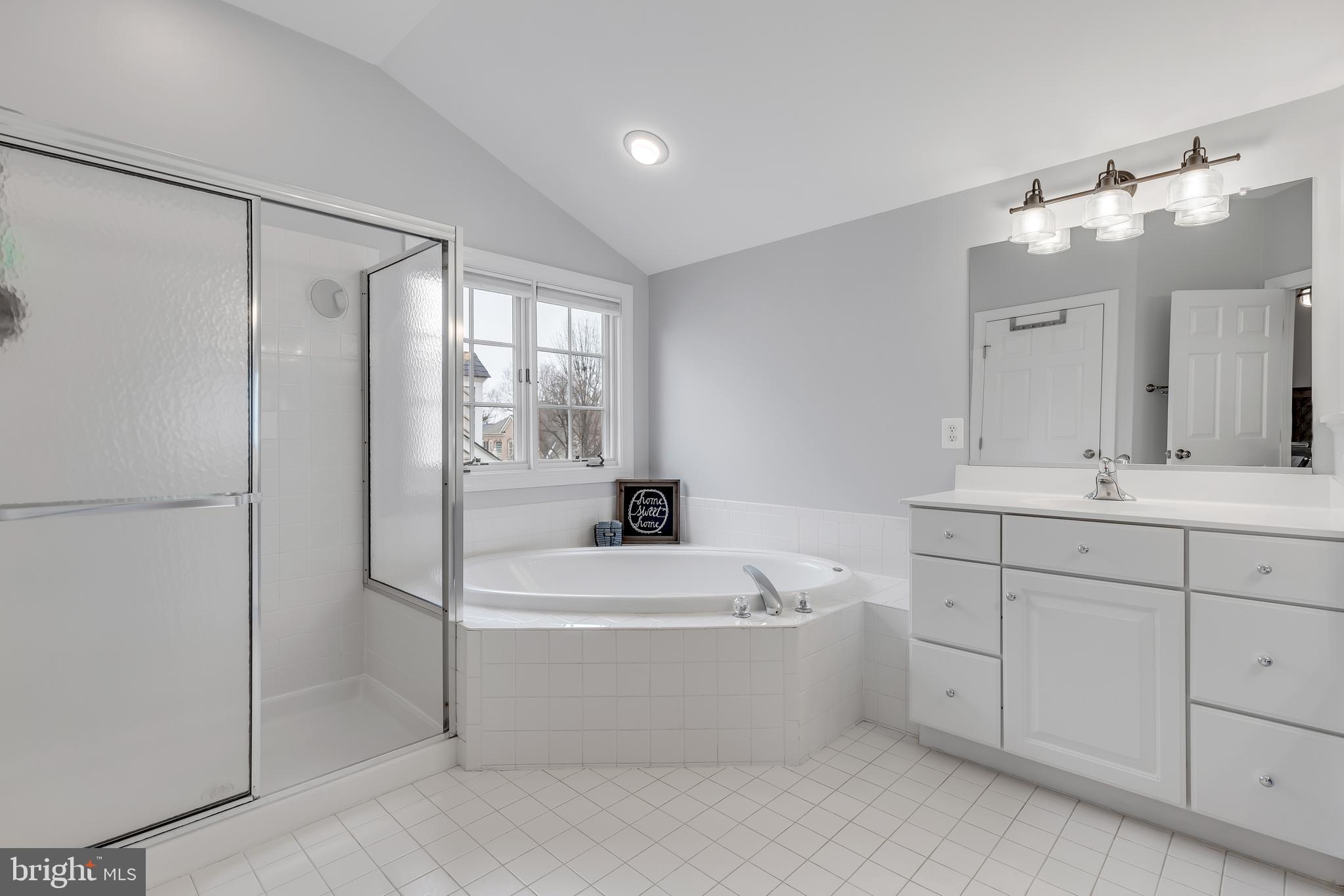 14413 Clubhouse Road Gainesville, VA 20155 - Photo 29 of 59 En Suite Bathroom with Separate Soaking Tub