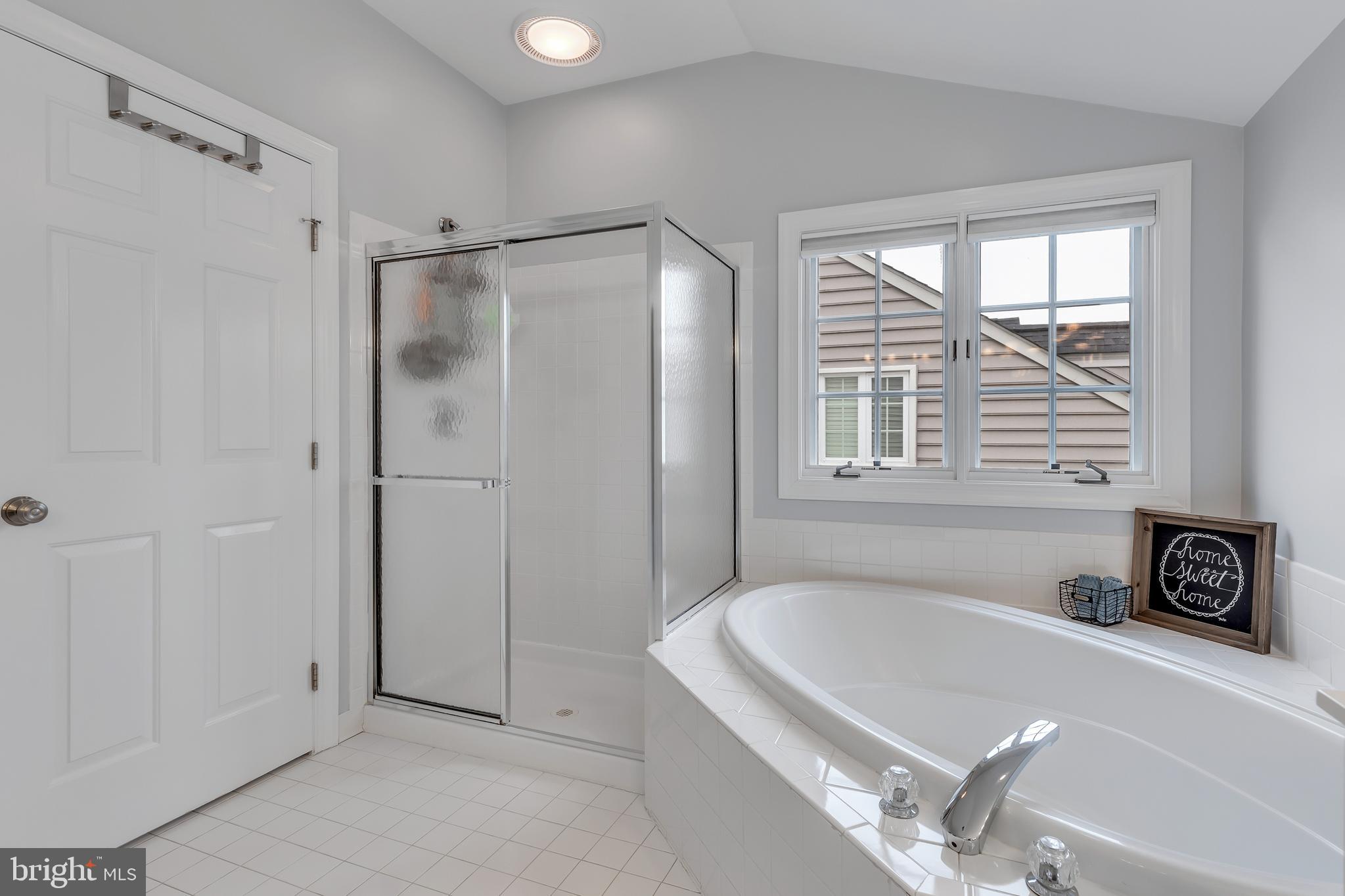 14413 Clubhouse Road Gainesville, VA 20155 - Photo 30 of 59 En Suite Bathroom with Separate Soaking Tub