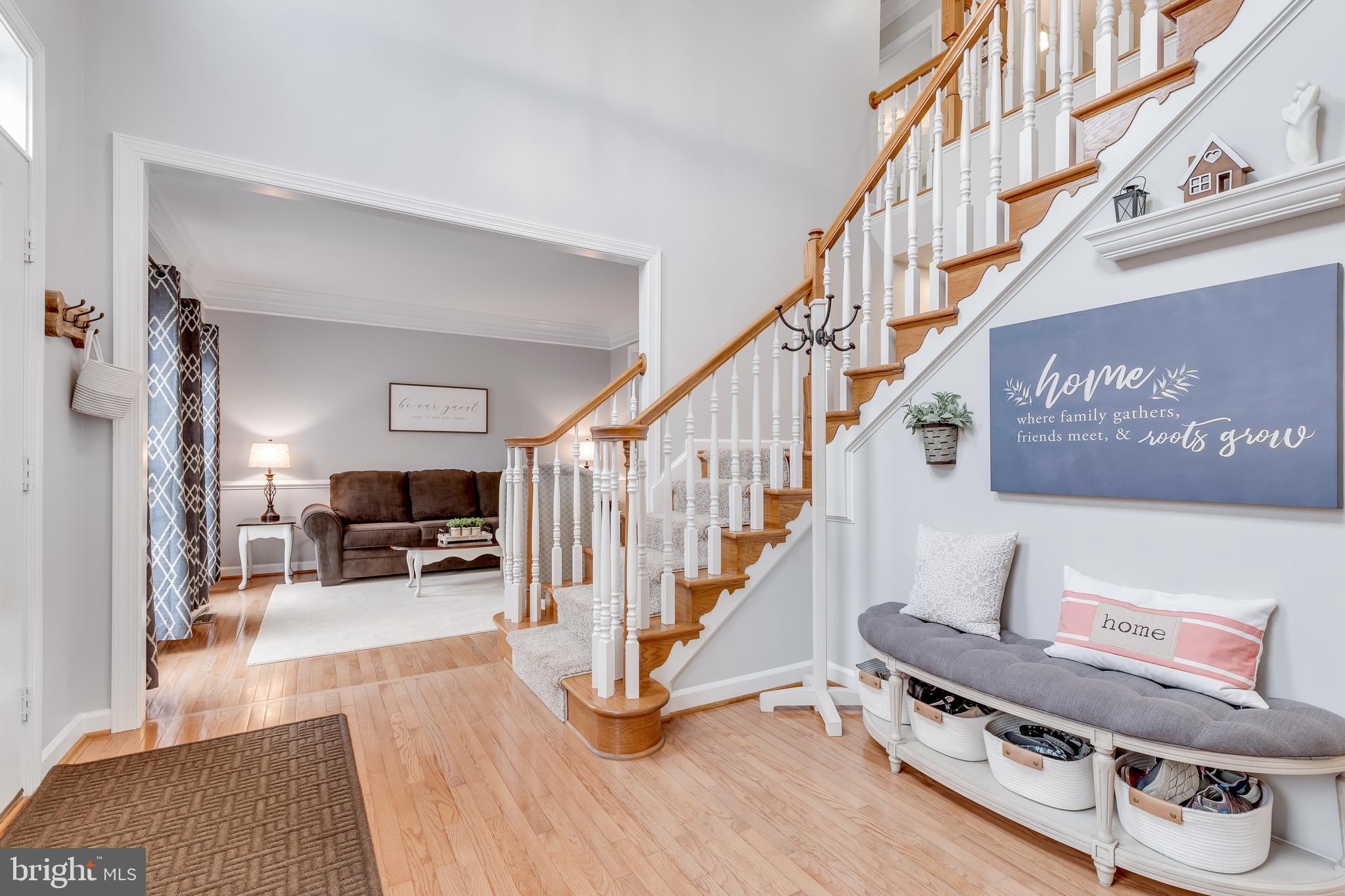14413 Clubhouse Road Gainesville, VA 20155 - Photo 5 of 59 Two Story Foyer with Beautiful Wood Floors