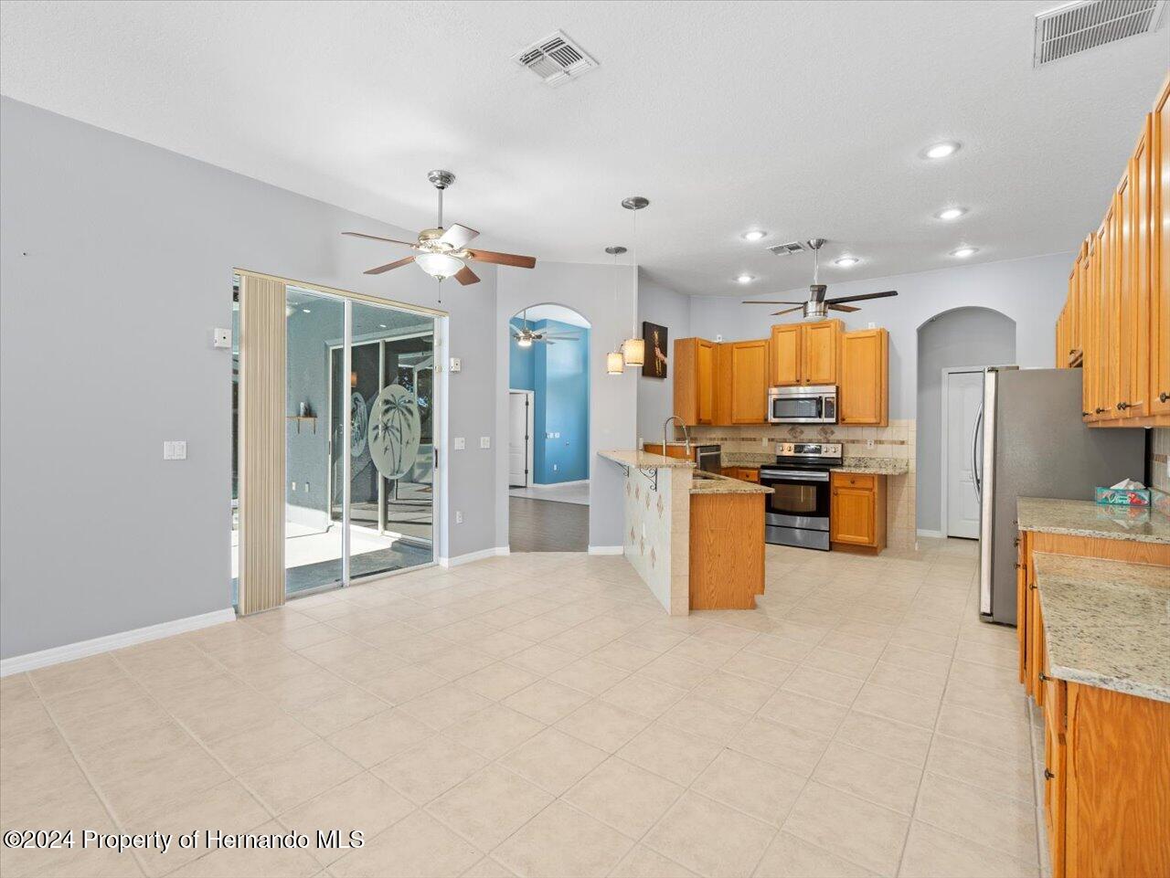 10307 Ridge Top Loop Spring Hill, FL 34613 - Photo 13 of 50 13-Kitchen_Breakfast Nook