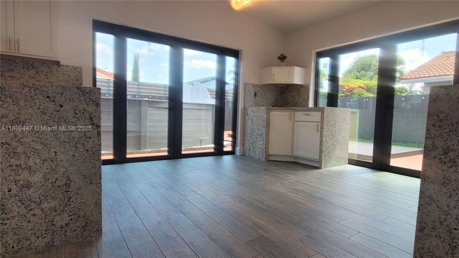 14641 Southwest 52nd Street Miami, FL 33175 - Photo 21 of 26 a view of a kitchen with a sink and a window