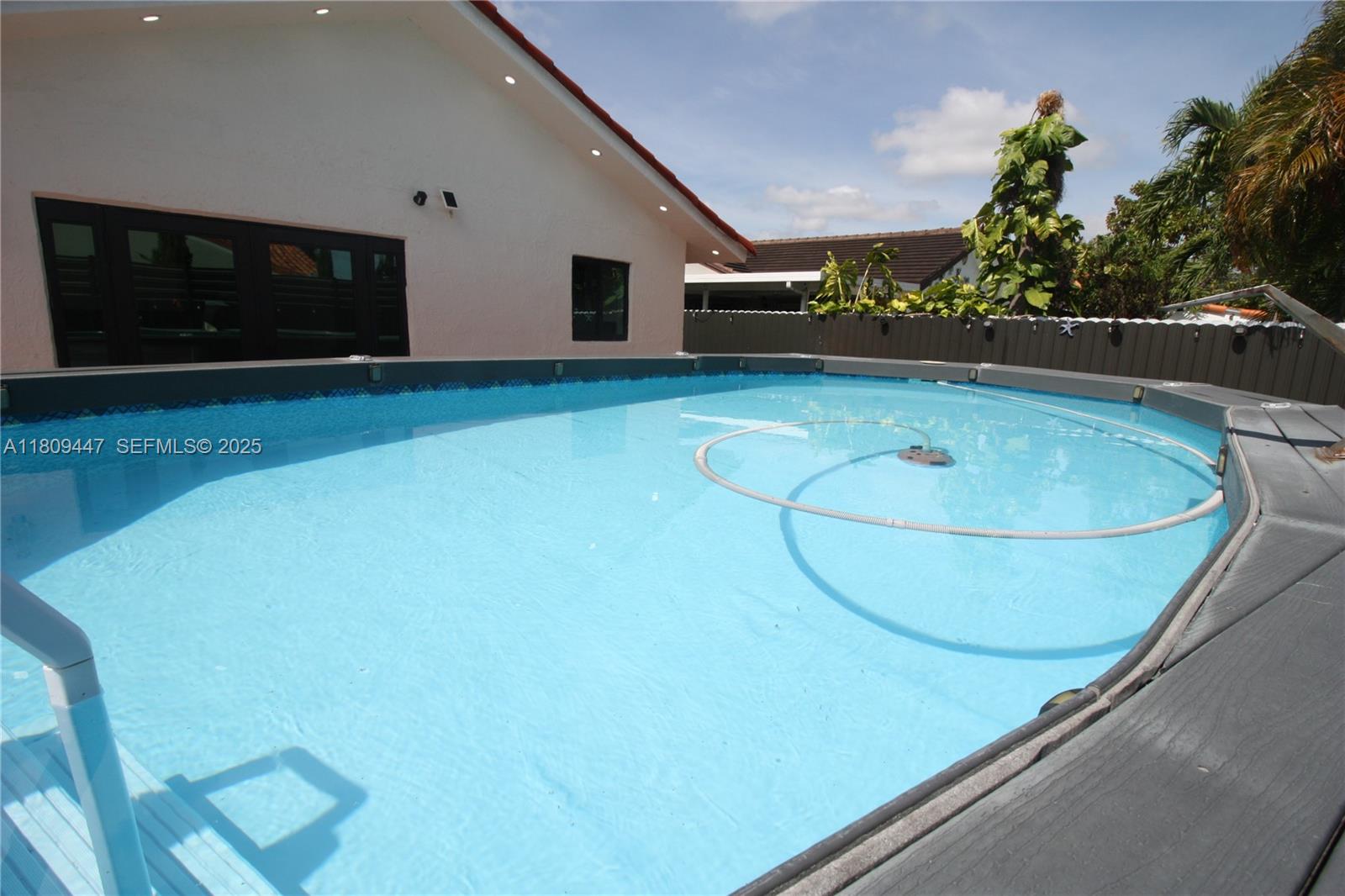14641 Southwest 52nd Street Miami, FL 33175 - Photo 24 of 26 a room with wooden floor and pool table