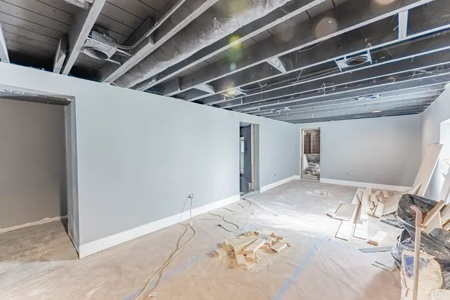 a view of a room with bed