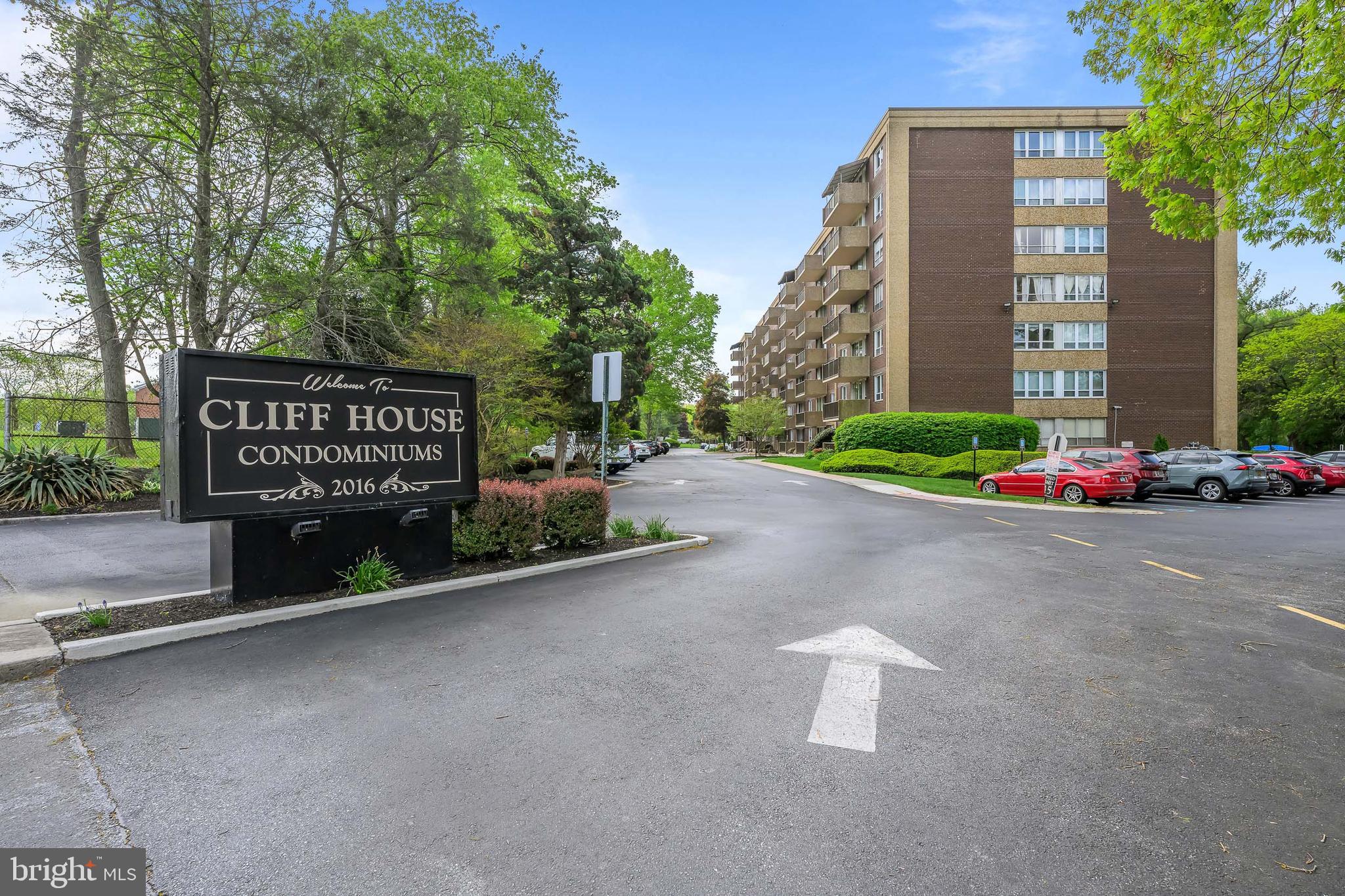 2016 Naamans Road, Unit 5E Wilmington, DE 19810 - Photo 2 of 24 a sign board with a building in the background