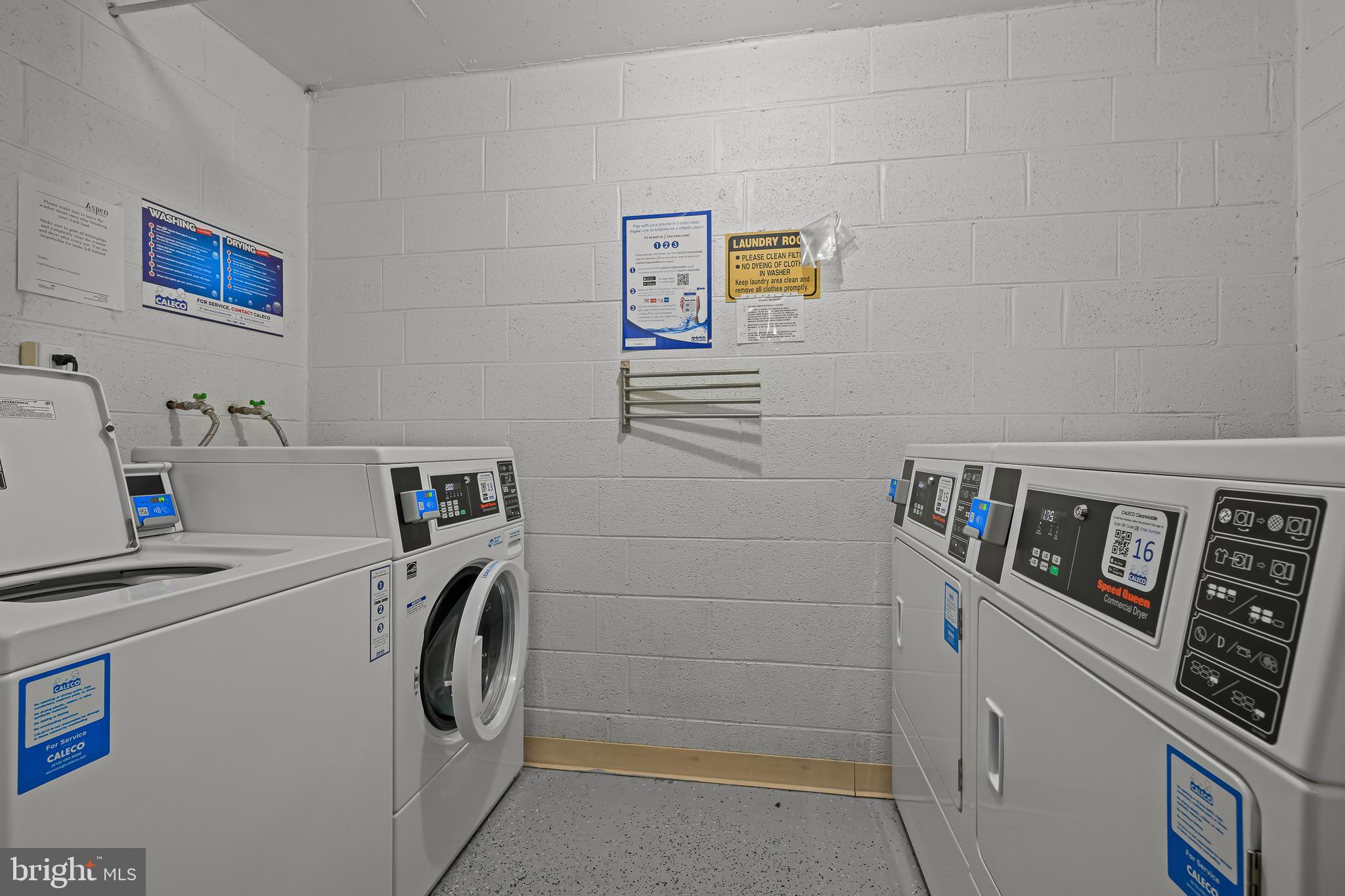 2016 Naamans Road, Unit 5E Wilmington, DE 19810 - Photo 24 of 24 a utility room with dryer and washer