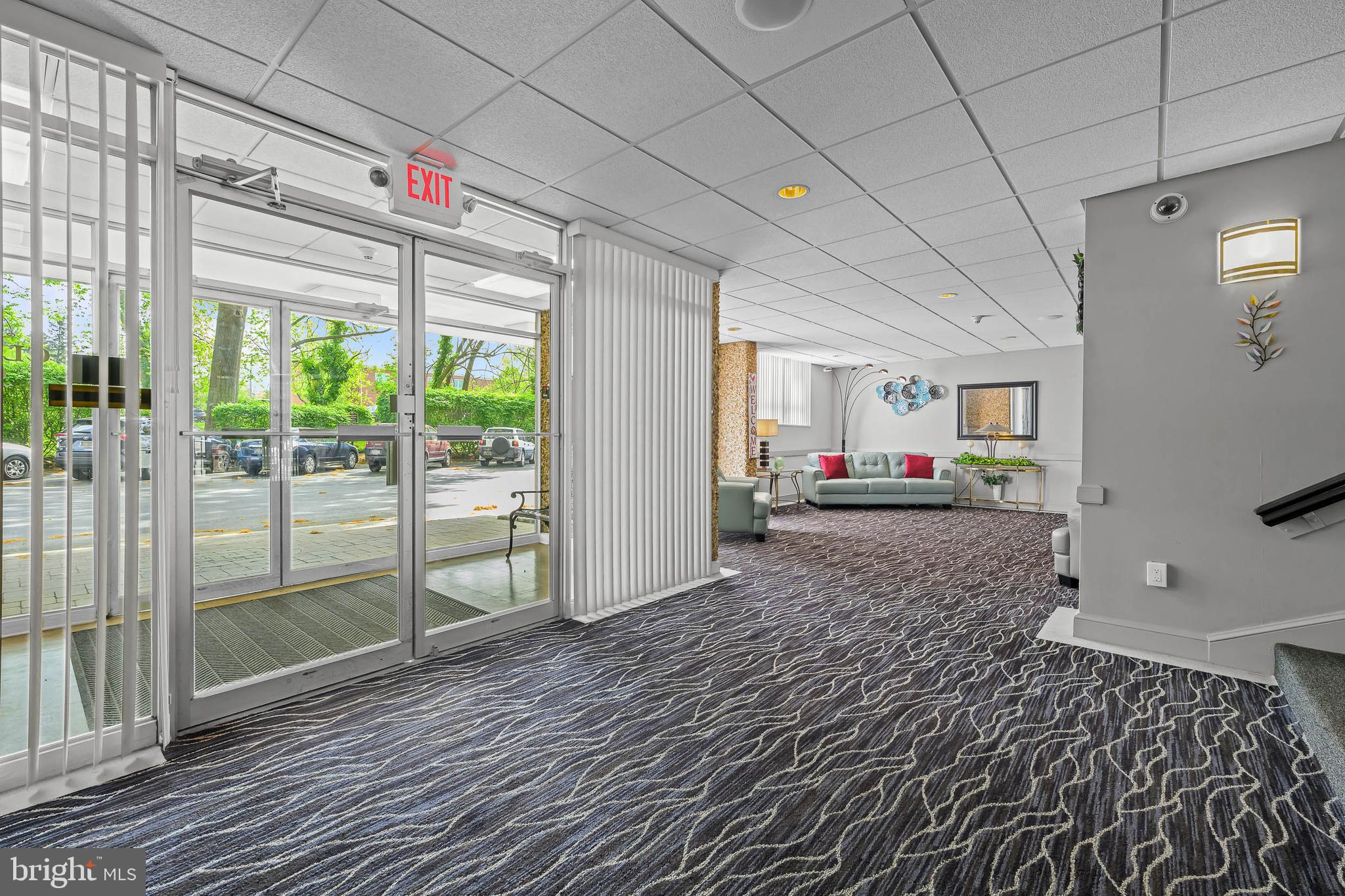 2016 Naamans Road, Unit 5E Wilmington, DE 19810 - Photo 5 of 24 a living room with furniture