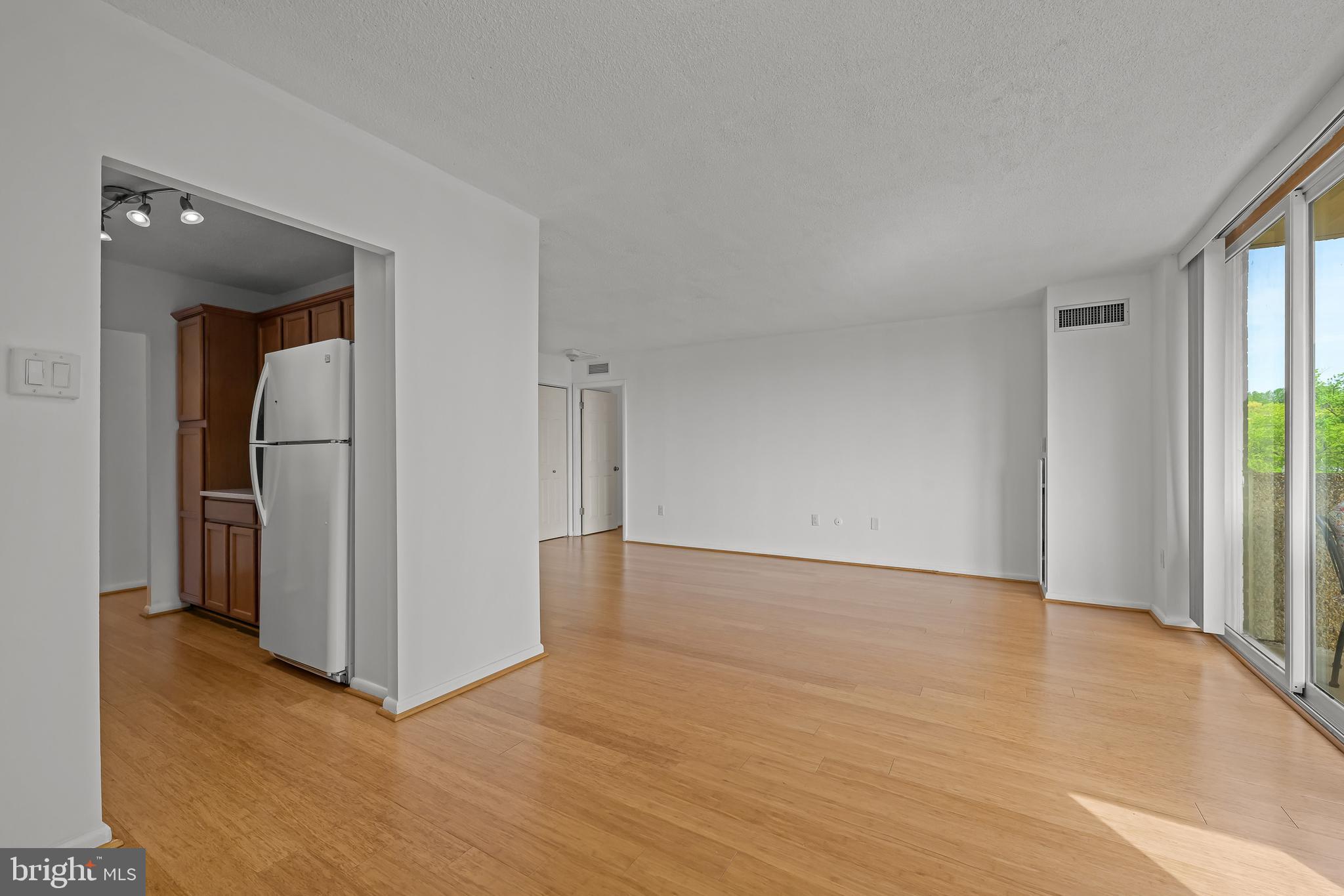 2016 Naamans Road, Unit 5E Wilmington, DE 19810 - Photo 10 of 24 a view of an empty room with a window