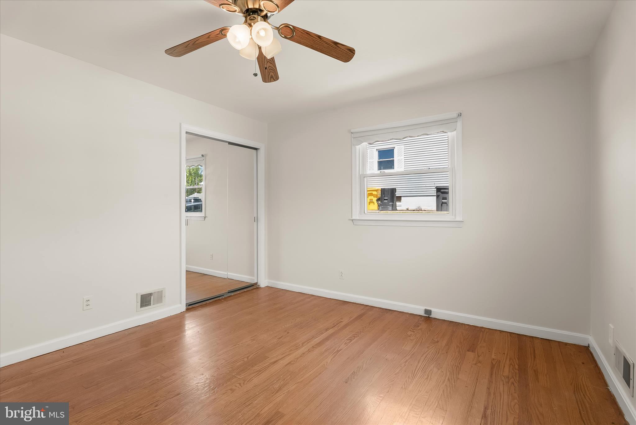5810 Ritchie Street Glen Burnie, MD 21061 - Photo 21 of 55 a view of empty room with wooden floor