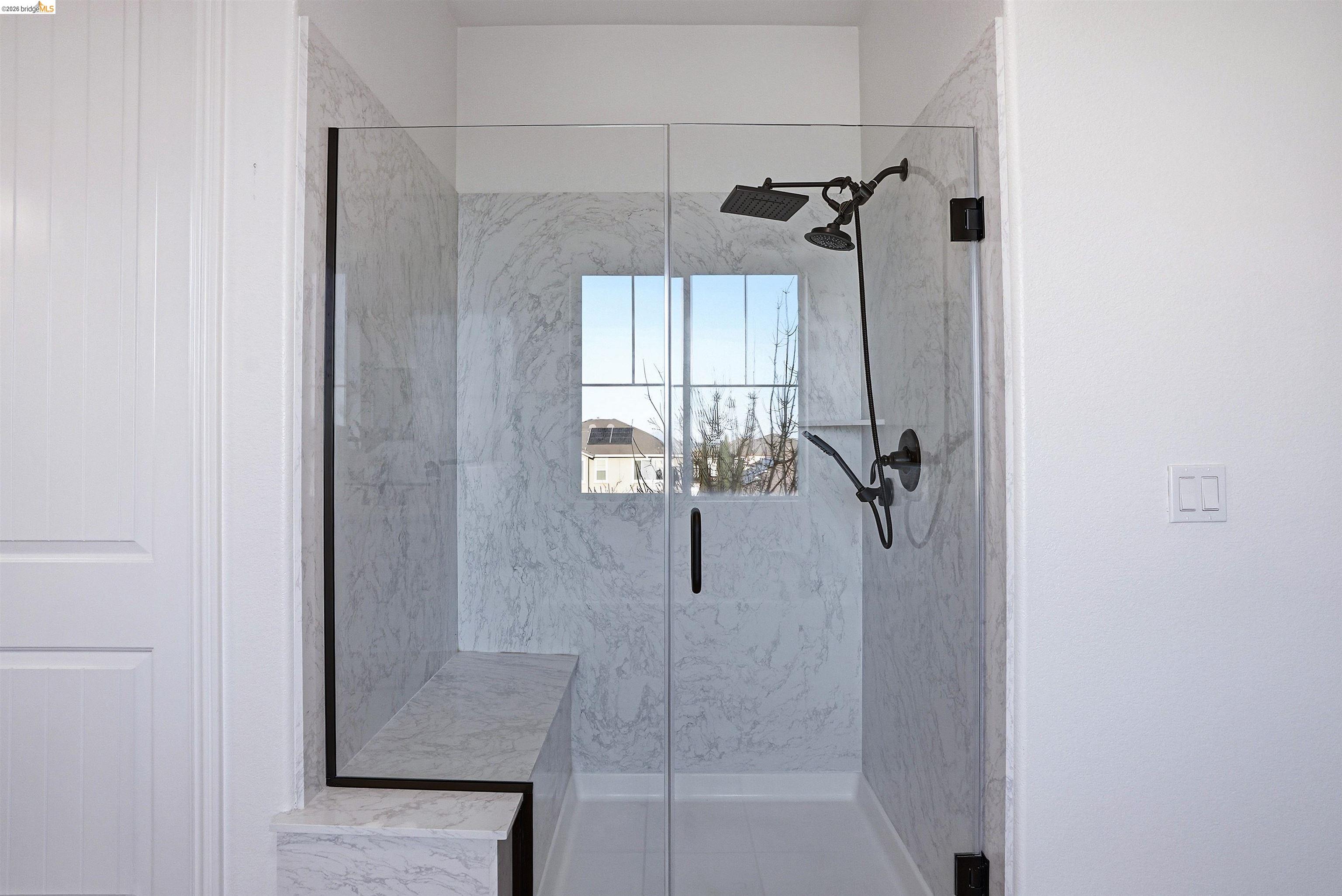 2525 Modena Drive Pittsburg, CA 94565 - Photo 24 of 34 a bathroom that has a glass shower door