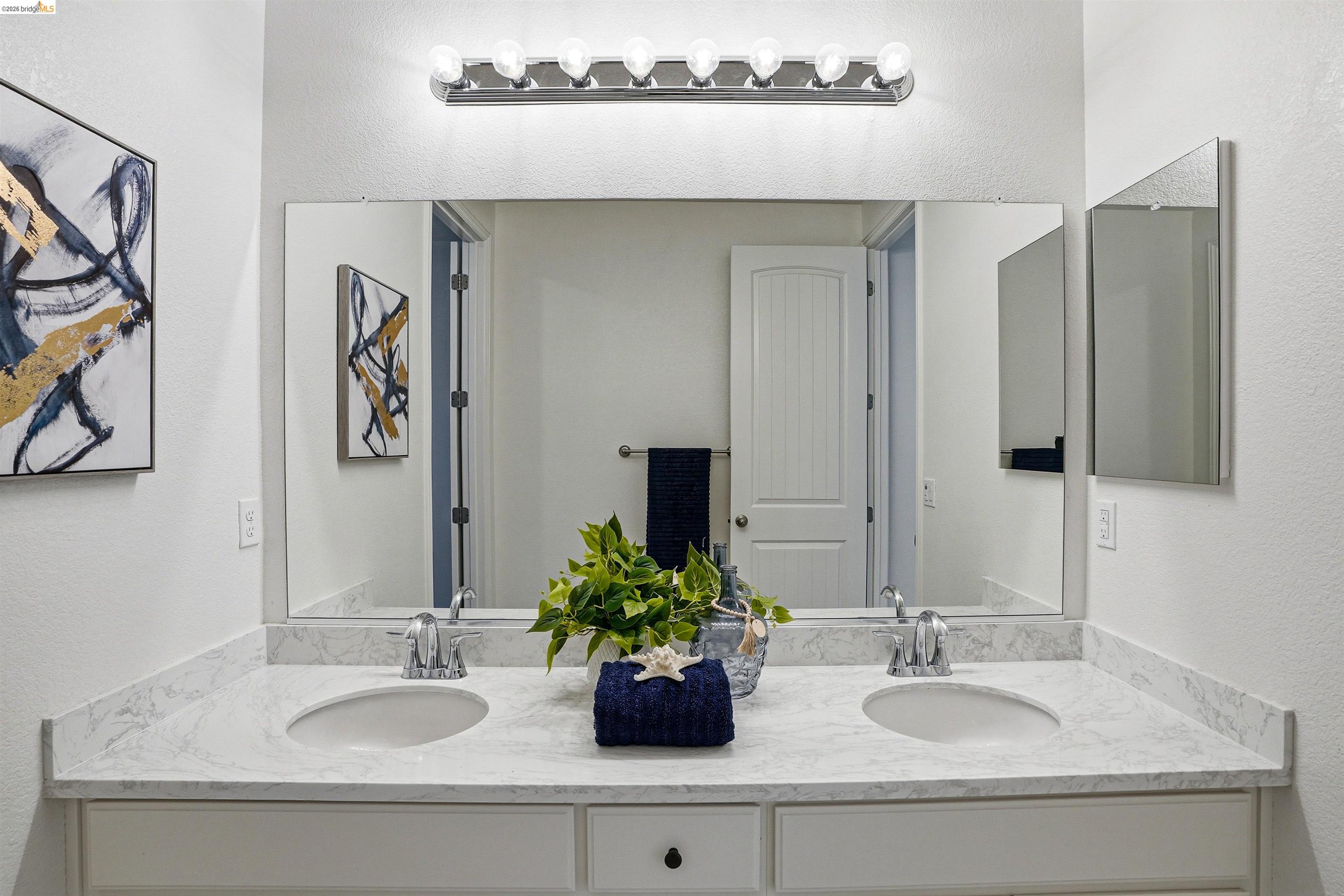 2525 Modena Drive Pittsburg, CA 94565 - Photo 25 of 34 a bathroom with a sink and a mirror