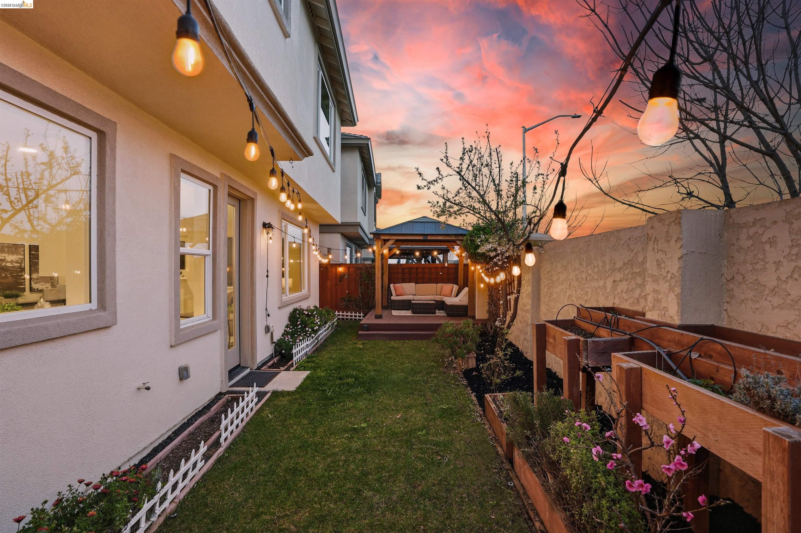 2525 Modena Drive Pittsburg, CA 94565 - Photo 32 of 34 a view of a backyard with wooden fence