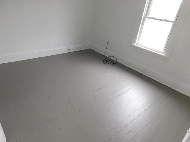 an empty room with a window