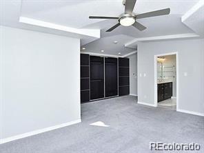 244 South Monroe Street Denver, CO 80209 - Photo 11 of 16 an empty room with closet and a ceiling fan