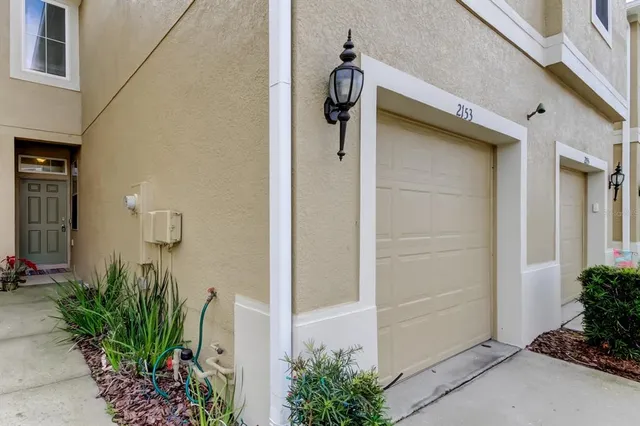 a house that has a potted plant on it