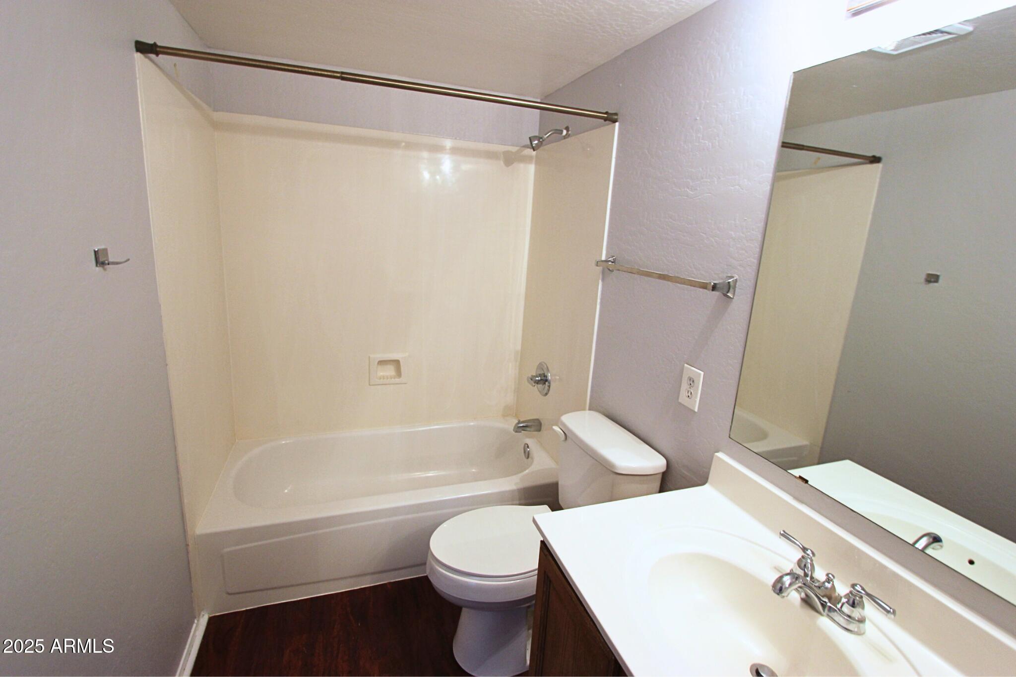 1115 South Tiago Drive Gilbert, AZ 85233 - Photo 15 of 22 a bathroom with a sink toilet and shower