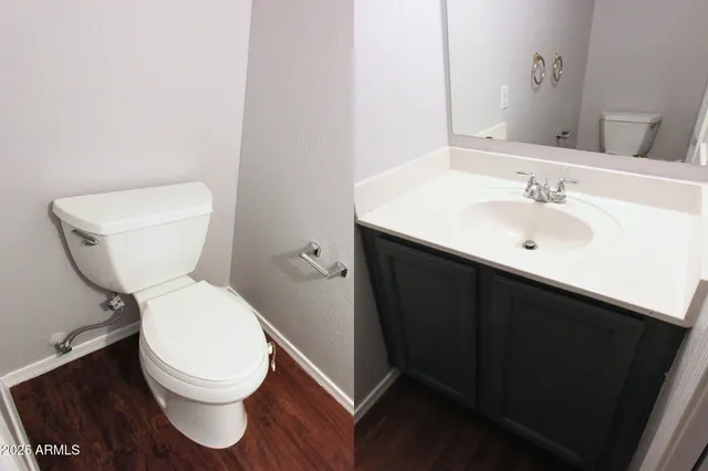 a white toilet sitting next to a bathroom sink