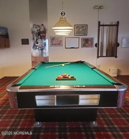 a kitchen with stainless steel appliances kitchen island granite countertop lots of counter top space