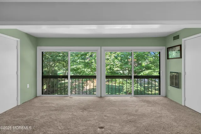 a view of a livingroom with furniture