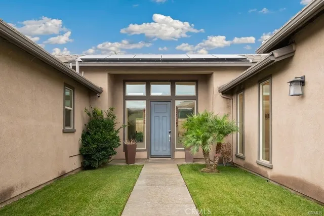 a front view of house with yard