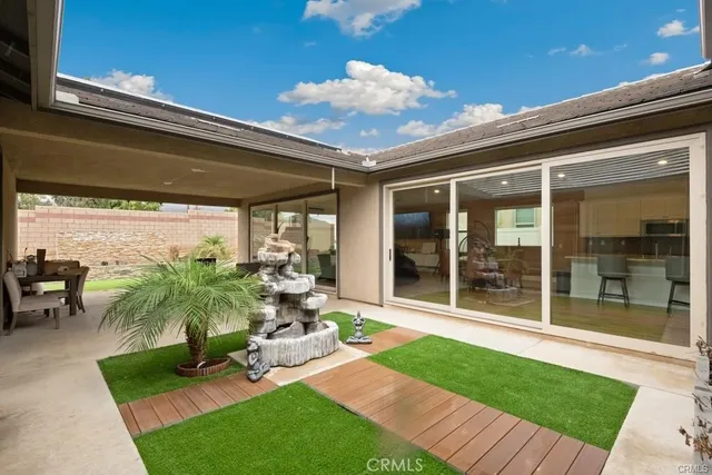 a view of a porch with furniture and floor