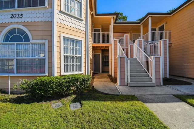 a front view of a house with yard