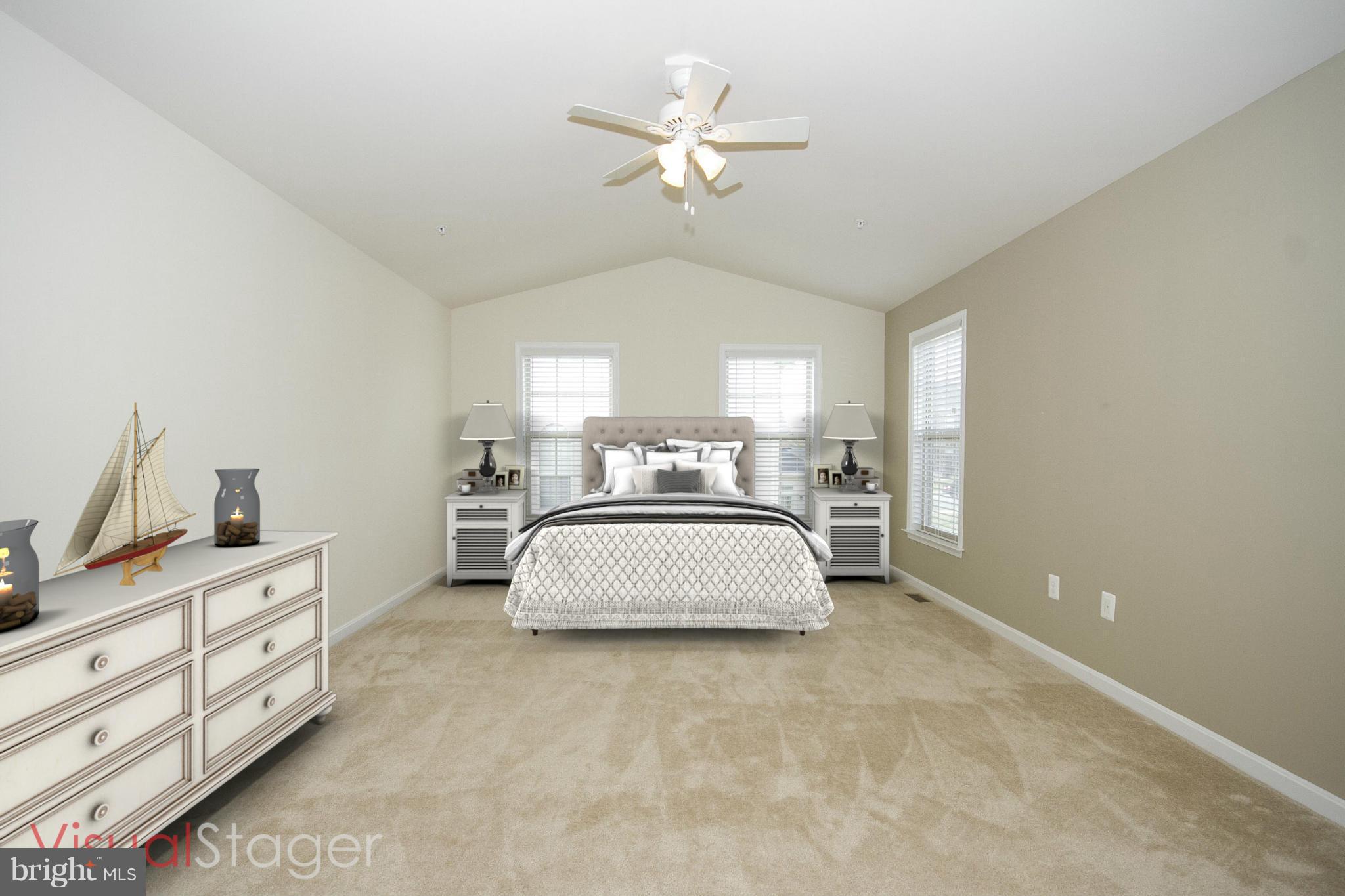 4310 Stoss Road Perry Hall, MD 21128 - Photo 12 of 22 a spacious bedroom with a bed and a chandelier