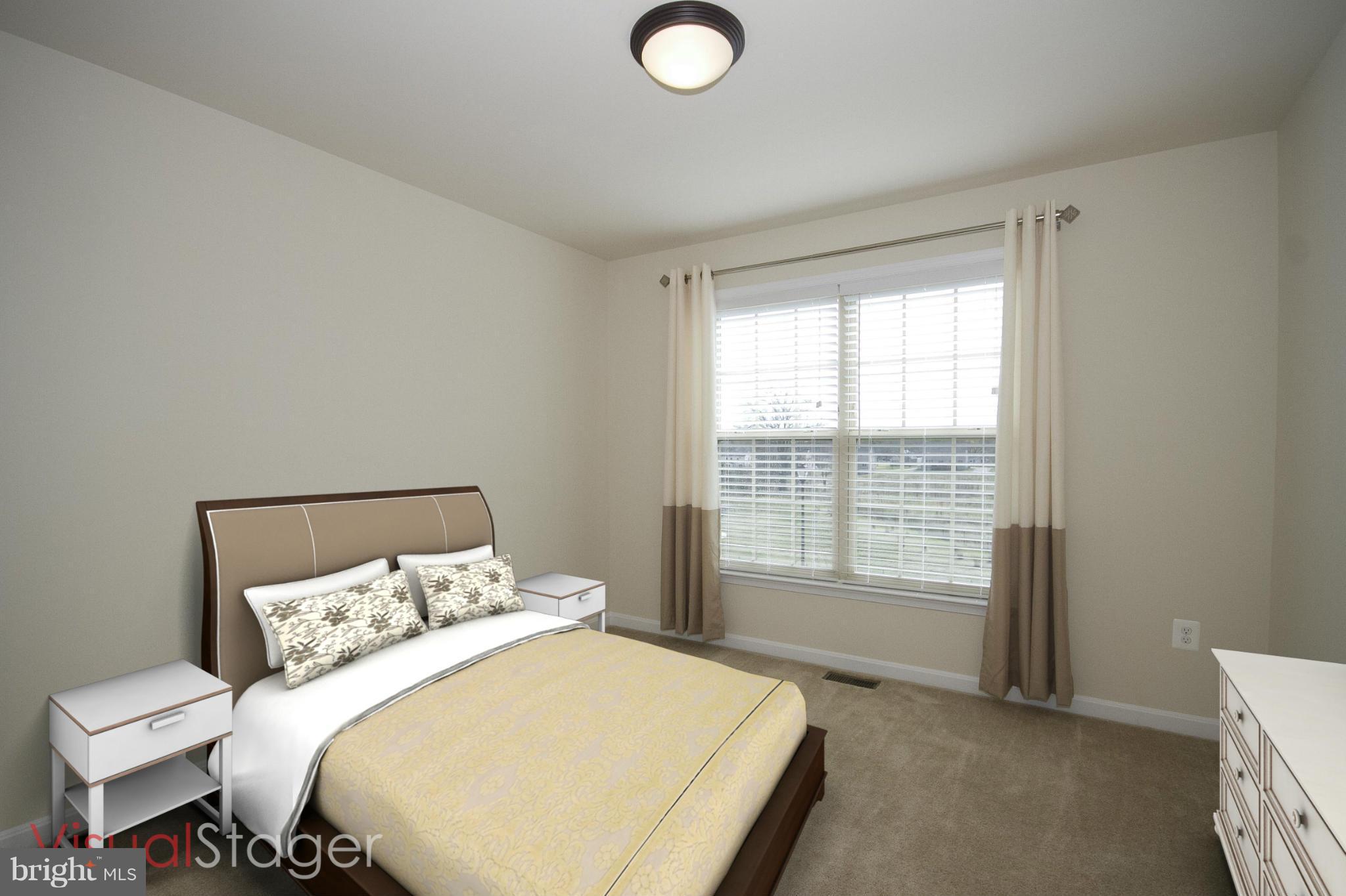 4310 Stoss Road Perry Hall, MD 21128 - Photo 15 of 22 a spacious bedroom with a bed and a window