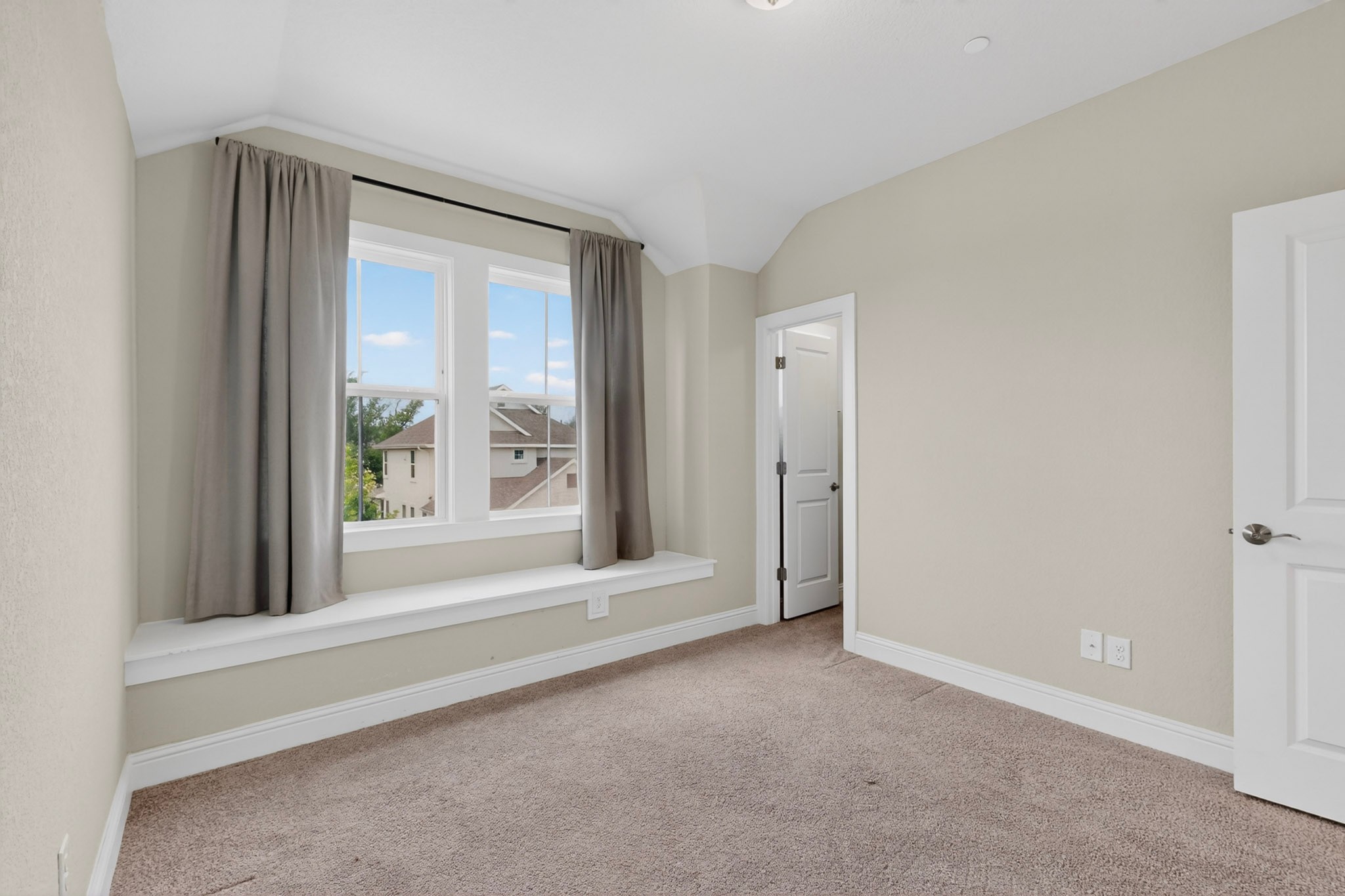 2605 Sam Bass Road, Unit 9 Round Rock, TX 78681 - Photo 29 of 38 A window seat offers a pleasant spot to unwind in this sun-drenched chamber.