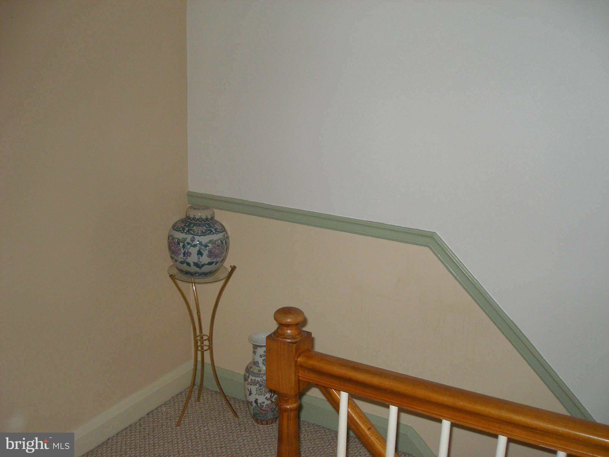 1516 Barrett Road Baltimore, MD 21207 - Photo 15 of 25 a close view of light fixtures and stairs