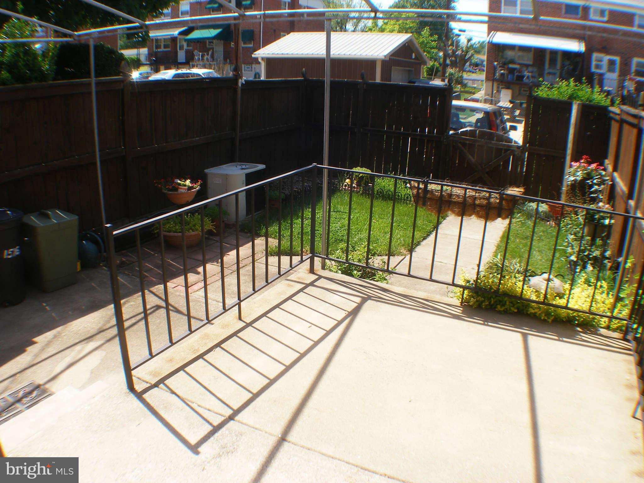 1516 Barrett Road Baltimore, MD 21207 - Photo 20 of 25 a view of balcony with a potted plant