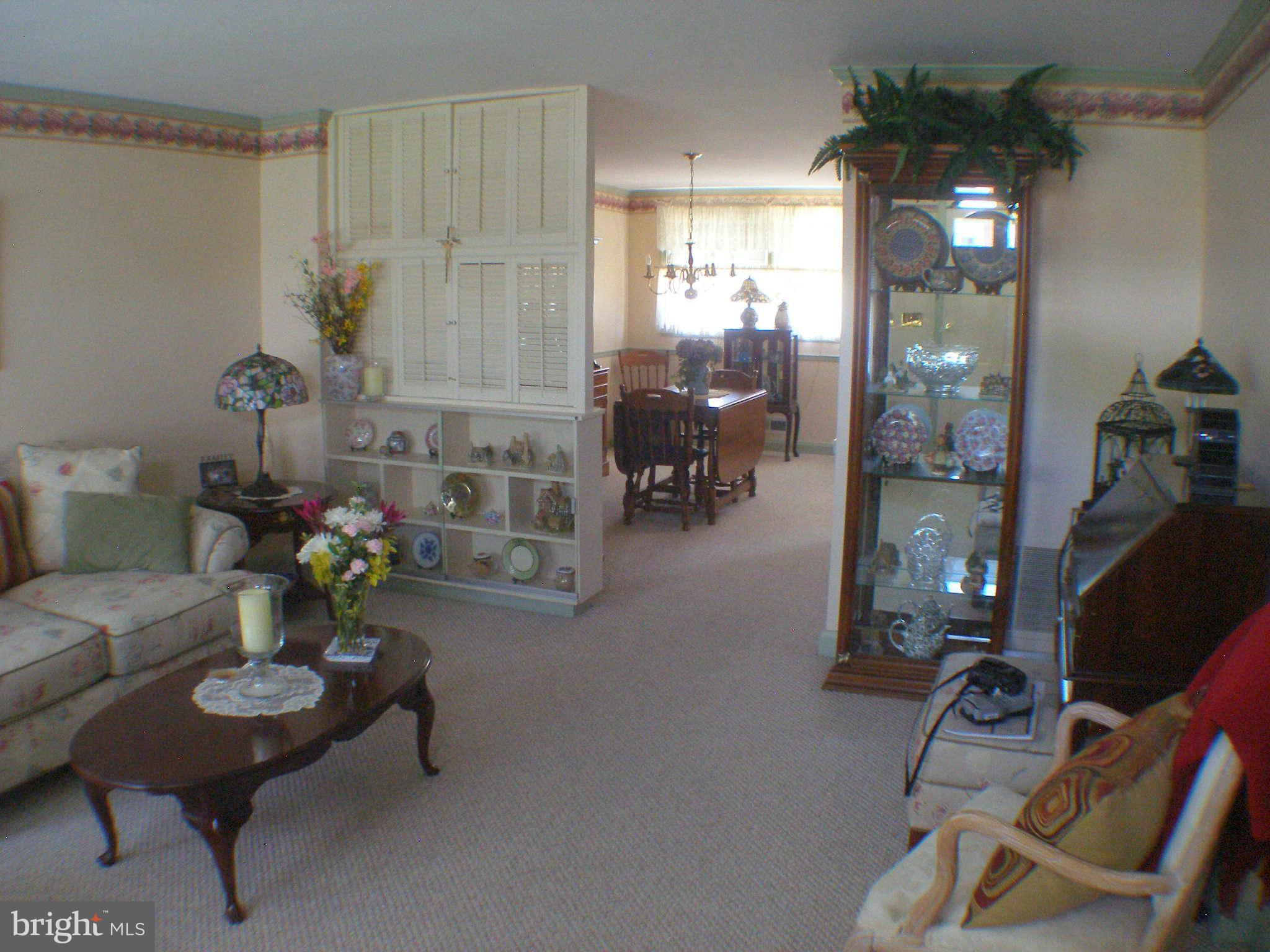 1516 Barrett Road Baltimore, MD 21207 - Photo 4 of 25 a living room with furniture and wooden floor