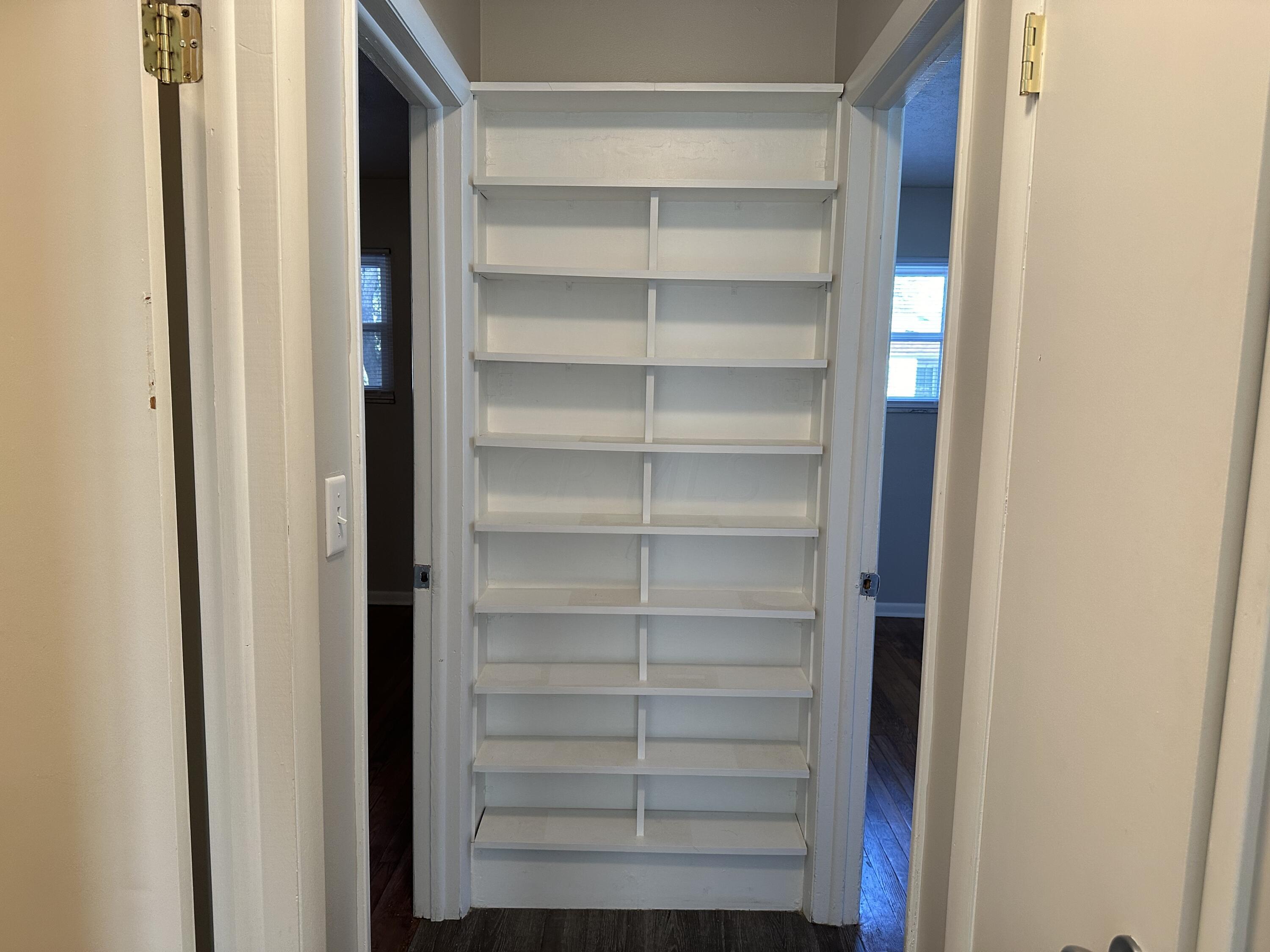 4770-4774 Etna Road Whitehall, OH 43213 - Photo 14 of 19 Built-in bookcase in hallway.