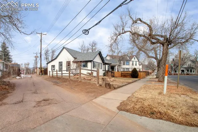 a view of a town with barn house