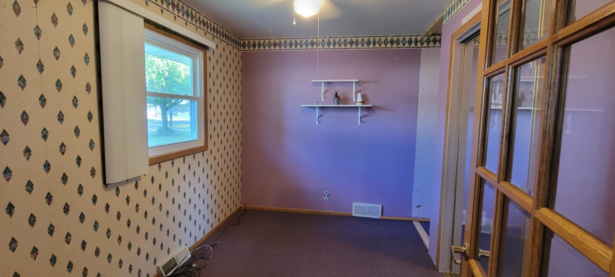 451 Rebecca Road Belvidere, IL 61008 - Photo 15 of 30 a view of a hallway with wooden floor and staircase